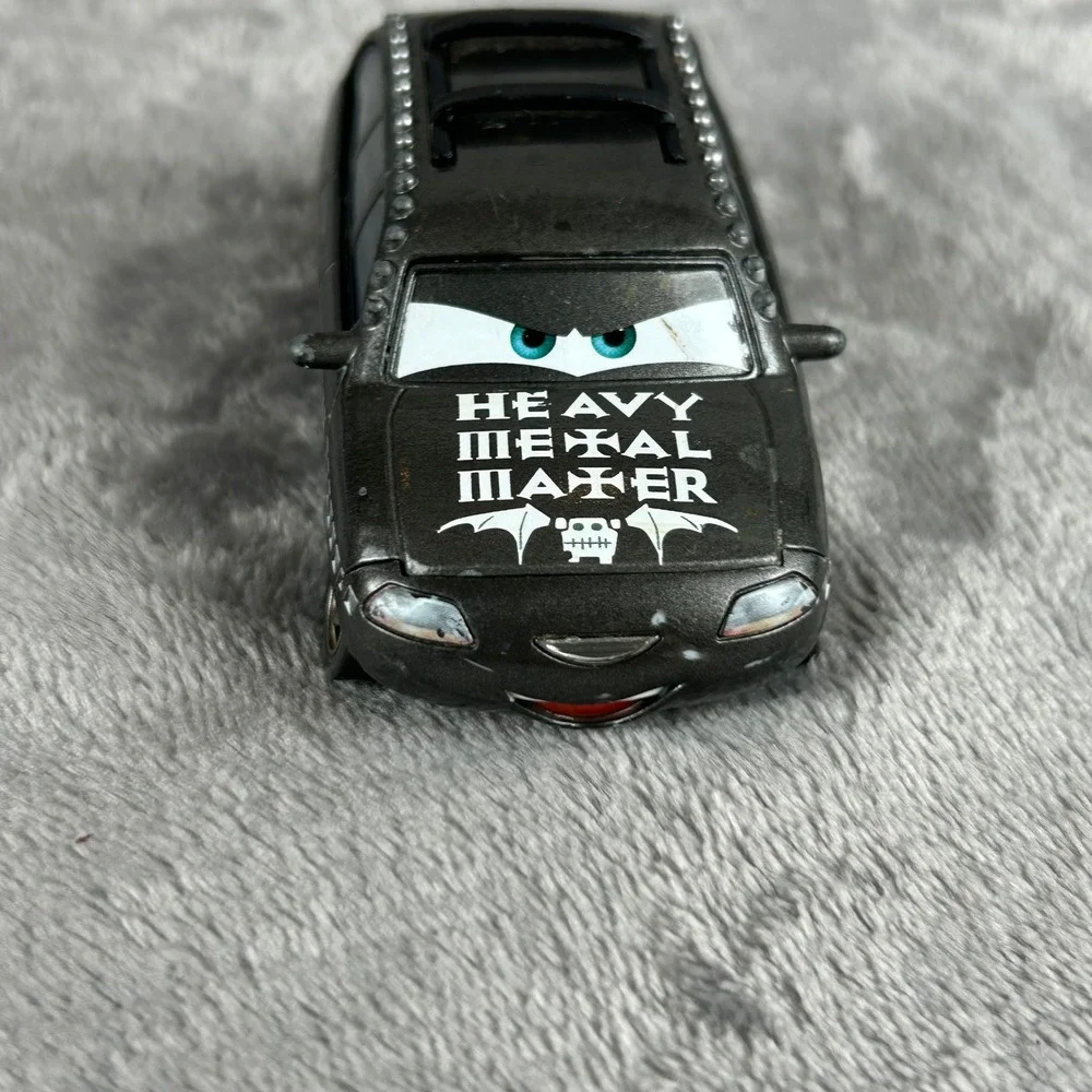 Disney Pixar Cars Heavy Metal Mater Diecast Rocking Rodney Minivan Black Studded